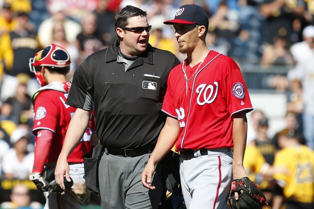 PITTSBURGH, PA - SEPTEMBER 25:  Home plate umpire Jordan Baker ejects A.J. Cole #22 of the Washington Nationals in the third inning during the game at PNC Park on September 25, 2016 in Pittsburgh, Pennsylvania.  (Photo by Justin K. Aller/Getty Images)