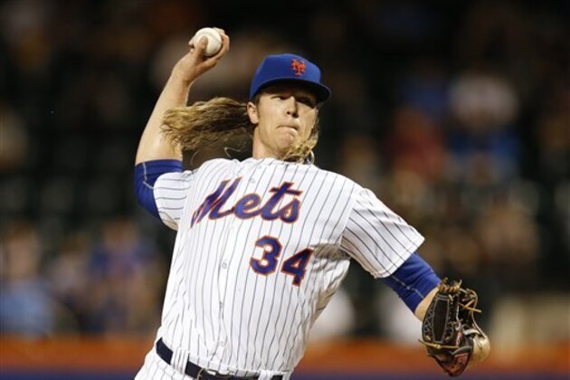 New York Mets starting pitcher Noah Syndergaard (34) delivers during the first inning of a baseball game against the Atlanta Braves, Monday, Sept. 19, 2016, in New York.  (AP Photo/Kathy Willens)