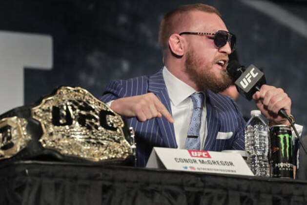 UFC featherweight champion Conor McGregor speaks during a news conference for UFC 205, Tuesday, Sept. 27, 2016, in New York. McGregor will challenge lightweight champion Eddie Alvarez for the lightweight belt on Nov. 12 in what will be the first UFC card to be held in New York after the state legislature legalized the sport earlier this year. (AP Photo/Julie Jacobson)