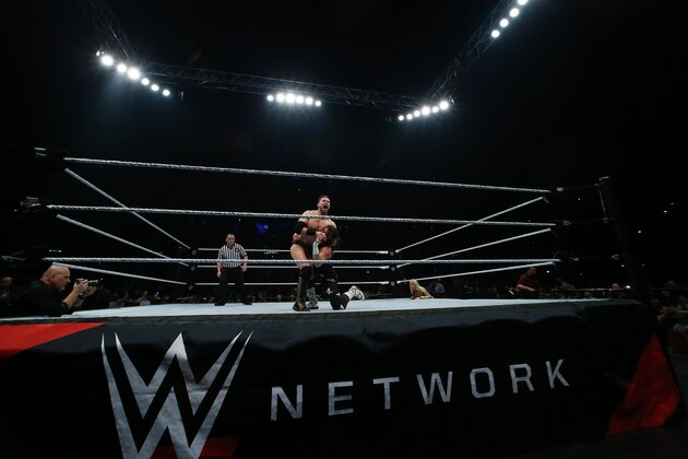 Wrestlers The Miz and Dolph Ziggler fight during a show at the AccorHotels Arena in Paris, as part of the WrestleMania Revenge Tour, the World Wrestling Entertainment (WWE) European tour, on April 22, 2016.  / AFP / THOMAS SAMSON        (Photo credit should read THOMAS SAMSON/AFP/Getty Images)