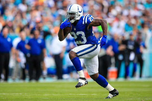 MIAMI GARDENS, FL - DECEMBER 27: Frank Gore #23 of the Indianapolis Colts rushes for a 37-yard touchdown during the first quarter of the game against the Miami Dolphins at Sun Life Stadium on December 27, 2015 in Miami Gardens, Florida.  (Photo by Rob Foldy/Getty Images)