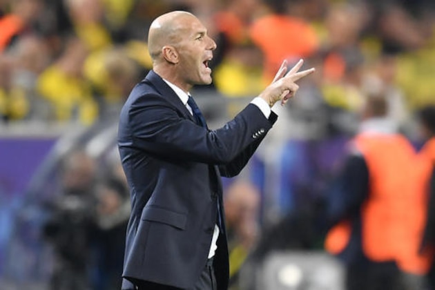 Real Madrid's head coach Zinedine Zidane directs his players during the Champions League group F soccer match between Borussia Dortmund and Real Madrid in Dortmund, Germany, Tuesday, Sept. 27, 2016. (AP Photo/Martin Meissner)