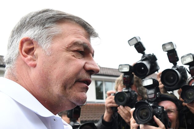 Former England national football team manager Sam Allardyce speaks to the press outside his home in Bolton on September 28, 2016.
Sam Allardyce's reign as England manager came to a humiliating end yesterday as he departed after just 67 days in charge following his controversial comments in a newspaper sting. / AFP / PAUL ELLIS        (Photo credit should read PAUL ELLIS/AFP/Getty Images)