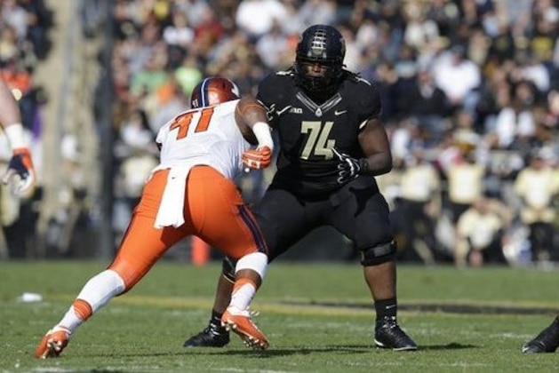 Purdue offensive lineman Martesse Patterson (74) blocks Illinois linebacker Jimmy Marchese (41) during the first half of an NCAA college football game in West Lafayette, Ind., Saturday, Nov. 7, 2015. (AP Photo/Michael Conroy)