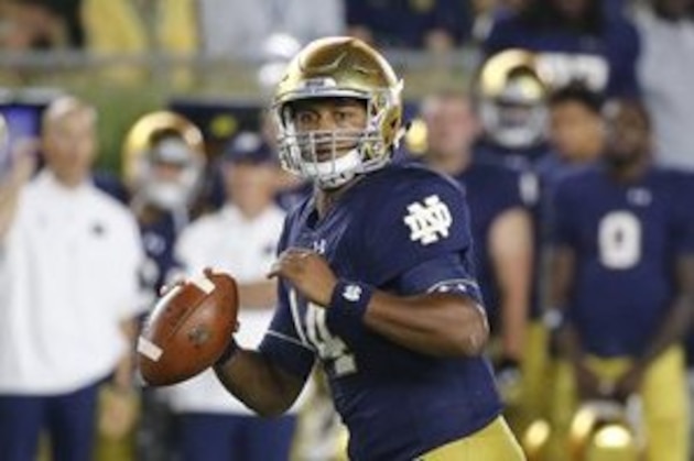 Notre Dame quarterback DeShone Kizer rolls out to pass during the second half of an NCAA college football game against Michigan State Saturday, Sept. 17, 2016, in South Bend, Ind. (AP Photo/Charles Rex Arbogast)