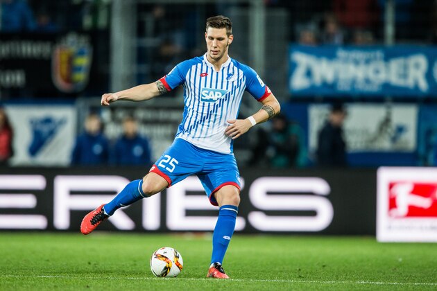 SINSHEIM, GERMANY - FEBRUARY 07:  Niklas Suele of Hoffenheim controls the ball during the Bundesliga match between 1899 Hoffenheim and SV Darmstadt 98 at Wirsol Rhein-Neckar-Arena on February 7, 2016 in Sinsheim, Germany.  (Photo by Simon Hofmann/Getty Images)