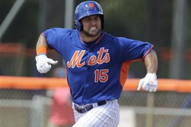 Tim Tebow reacts after hitting a solo home run in his first at bat during the first inning of his first instructional league baseball game for the New York Mets against the St. Louis Cardinals instructional club Wednesday, Sept. 28, 2016, in Port St. Lucie, Fla.  (AP Photo/Luis M. Alvarez)
