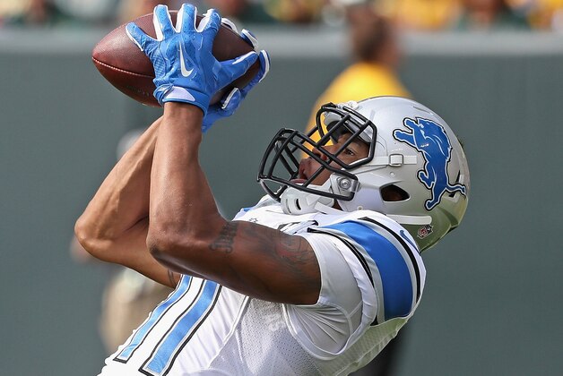 GREEN BAY, WI - SEPTEMBER 25: Marvin Jones #11 of the Detroit Lions catches a touchdown pass against the Green Bay Packers at Lambeau Field on September 25, 2016 in Green Bay, Wisconsin. The Packers defeated the Lions 34-27. (Photo by Jonathan Daniel/Getty Images)