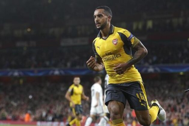 Arsenal's Theo Walcott reacts after scoring his sides' second goal during the Champions League group A soccer match between Arsenal and Basel at the Emirates stadium in London, Wednesday, Sept. 28, 2016. (AP Photo/Alastair Grant)