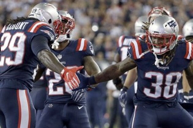 New England Patriots running back LeGarrette Blount, left, celebrates his touchdown with teammate Brandon Bolden (38) during the second half of an NFL football game against the Houston Texans Thursday, Sept. 22, 2016, in Foxborough, Mass. (AP Photo/Elise Amendola)