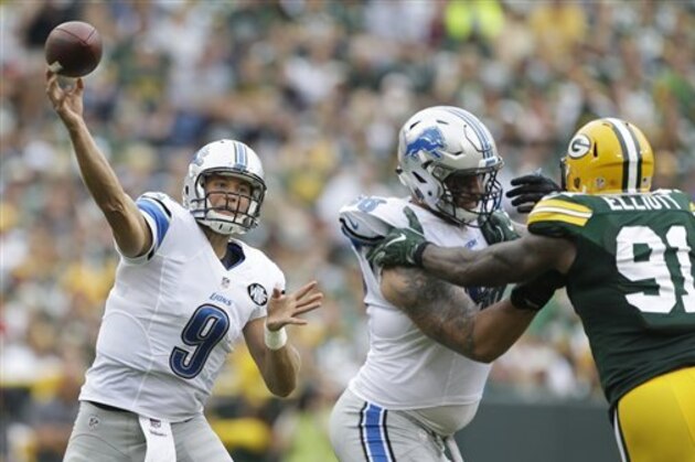 Detroit Lions' Matthew Stafford throws during the second half of an NFL football game against the Green Bay Packers Sunday, Sept. 25, 2016, in Green Bay, Wis. (AP Photo/Jeffrey Phelps)