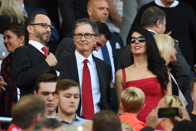 Liverpool's US owner John W. Henry (C) awaits kick off in the English Premier League football match between Liverpool and Leicester City at Anfield in Liverpool, north west England on September 10, 2016. / AFP / Paul ELLIS / RESTRICTED TO EDITORIAL USE. No use with unauthorized audio, video, data, fixture lists, club/league logos or 'live' services. Online in-match use limited to 75 images, no video emulation. No use in betting, games or single club/league/player publications.  /         (Photo credit should read PAUL ELLIS/AFP/Getty Images)