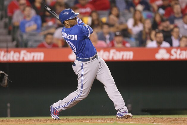 ANAHEIM, CALIFORNIA - SEPTEMBER 16:  Edwin Encarnacion #10 of the Toronto Blue Jays hits a two run home run in the ninth inning against the Los Angeles Angels of Anaheim at Angel Stadium of Anaheim on September 16, 2016 in Anaheim, California.  (Photo by Stephen Dunn/Getty Images)