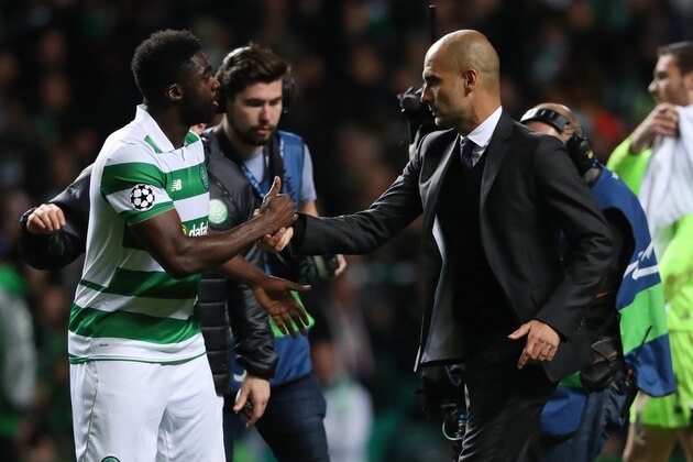 GLASGOW, SCOTLAND - SEPTEMBER 28: Kolo Toure of Celtic and Joseph Guardiola the head coach / manager of Manchester City greet each other at the end of the UEFA Champions League match between Celtic and Manchester City at Celtic Park on September 28, 2016 in Glasgow, Scotland. (Photo by Matthew Ashton - AMA/Getty Images)