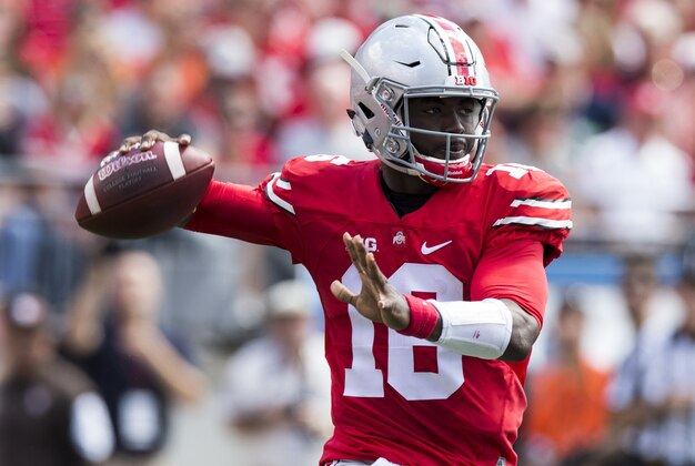 Sep 3, 2016; Columbus, OH, USA; Ohio State Buckeyes quarterback J.T. Barrett (16) looks for an open receiver against the Bowling Green Falcons at Ohio Stadium. Mandatory Credit: Greg Bartram-USA TODAY Sports