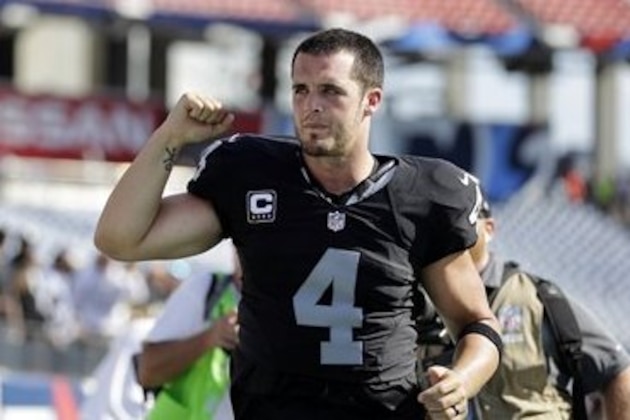 Oakland Raiders quarterback Derek Carr leaves the field after the Raiders beat the Tennessee Titans 17-10 in an NFL football game Sunday, Sept. 25, 2016, in Nashville, Tenn. (AP Photo/Weston Kenney)