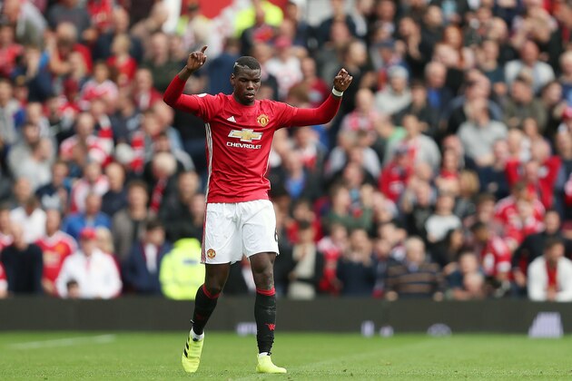 MANCHESTER, ENGLAND - SEPTEMBER 24: Paul Pogba of Manchester United celebrates after scoring a goal to make it 4-0 during the Premier League match between Manchester United and Leicester City at Old Trafford on September 24, 2016 in Manchester, England. (Photo by James Baylis - AMA/Getty Images)