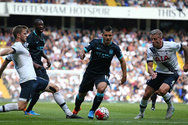 Manchester City's Argentinian striker Sergio Aguero (2nd R) vies with Tottenham Hotspur's Belgian defender Toby Alderweireld (R) and Tottenham Hotspur's English defender Eric Dier (L) the English Premier League football match between Tottenham Hotspur and Manchester City at White Hart Lane in north London on September 26, 2015. AFP PHOTO / JUSTIN TALLIS  RESTRICTED TO EDITORIAL USE. No use with unauthorized audio, video, data, fixture lists, club/league logos or 'live' services. Online in-match use limited to 75 images, no video emulation. No use in betting, games or single club/league/player publications.        (Photo credit should read JUSTIN TALLIS/AFP/Getty Images)