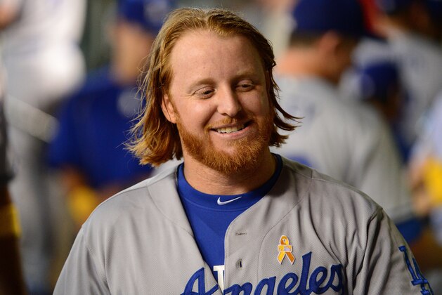 PHOENIX, AZ - SEPTEMBER 17:  Justin Turner #10 of the Los Angeles Dodgers smiles when walking through the dugout prior to the game against the Arizona Diamondbacks at Chase Field on September 17, 2016 in Phoenix, Arizona. The Dodgers won 6 - 2.  (Photo by Jennifer Stewart/Getty Images)
