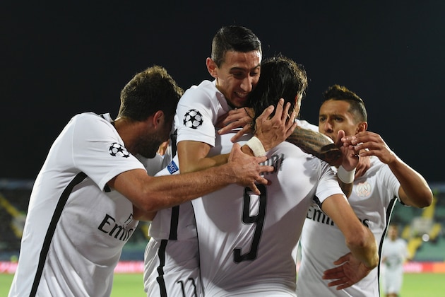 Paris Saint-Germain's Uruguayan forward Edinson Cavani (C) celebrates with teammates after scoring during the UEFA Champions League Group A football match between Ludogorets Razgrad and Paris Saint-Germain (PSG) at Vasil Levski National Stadium in Sofia on September 28, 2016.  / AFP / DIMITAR DILKOFF        (Photo credit should read DIMITAR DILKOFF/AFP/Getty Images)