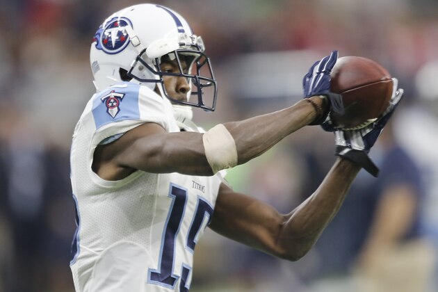HOUSTON, TX - NOVEMBER 01: Justin Hunter #15 of the Tennessee Titans warms up before playing against the Houston Texans on November 1, 2015 at NRG Stadium in Houston, Texas. (Photo by Thomas B. Shea/Getty Images)