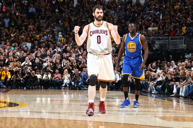 CLEVELAND, OH - JUNE 16: Kevin Love #0 of the Cleveland Cavaliers celebrates against the Golden State Warriors in Game Six of the 2016 NBA Finals on June 16, 2016 at Quicken Loans Arena in Cleveland, Ohio.  NOTE TO USER: User expressly acknowledges and agrees that, by downloading and or using this Photograph, user is consenting to the terms and conditions of the Getty Images License Agreement. Mandatory Copyright Notice: Copyright 2016 NBAE (Photo by Nathaniel S. Butler/NBAE via Getty Images)