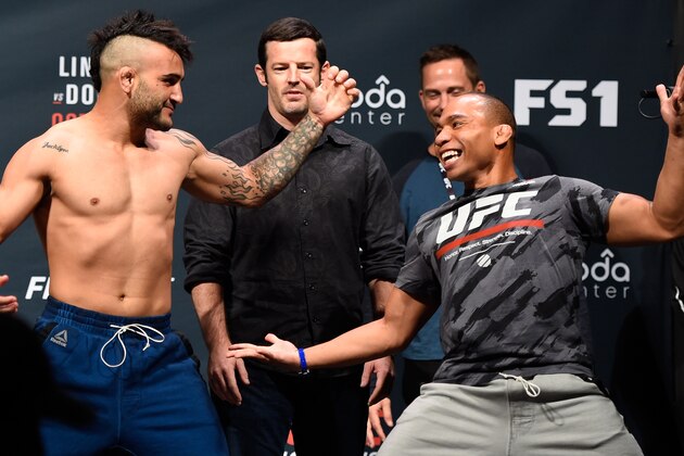 PORTLAND, OR - SEPTEMBER 30:  (L-R) John Lineker of Brazil and John Dodson face-off during the UFC Fight Night weigh-in at the Oregon Convention Center on September 30, 2016 in Portland, Oregon. (Photo by Josh Hedges/Zuffa LLC/Zuffa LLC via Getty Images)