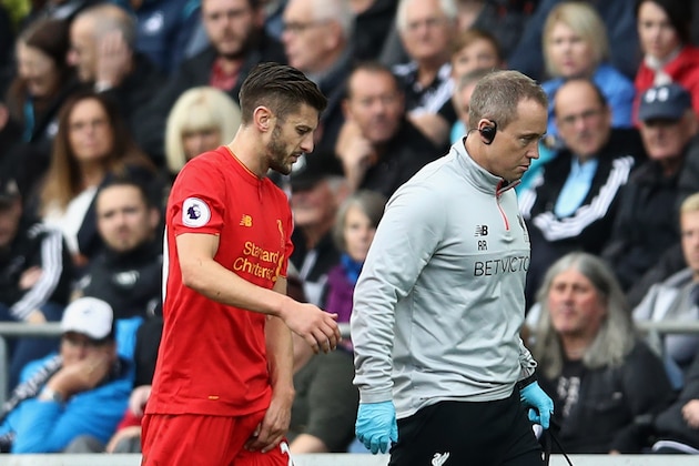 SWANSEA, WALES - OCTOBER 01: Adam Lallana of Liverpool is talen off injured during the Premier League match between Swansea City and Liverpool at Liberty Stadium on October 1, 2016 in Swansea, Wales.  (Photo by Julian Finney/Getty Images)