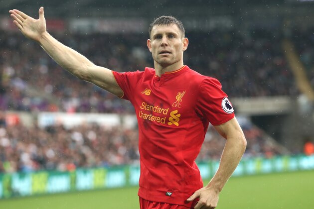 SWANSEA, WALES - OCTOBER 01:  James Milner of Liverpool celebrates scoring his sides second goal during the Premier League match between Swansea City and Liverpool at Liberty Stadium on October 1, 2016 in Swansea, Wales.  (Photo by Julian Finney/Getty Images)