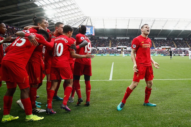 SWANSEA, WALES - OCTOBER 01:  James Milner of Liverpool celebrates scoring his sides second goal during the Premier League match between Swansea City and Liverpool at Liberty Stadium on October 1, 2016 in Swansea, Wales.  (Photo by Julian Finney/Getty Images)