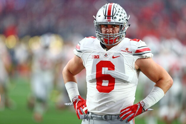 Jan 1, 2016; Glendale, AZ, USA; Ohio State Buckeyes defensive end Sam Hubbard (6) against the Notre Dame Fighting Irish during the 2016 Fiesta Bowl at University of Phoenix Stadium. The Buckeyes defeated the Fighting Irish 44-28. Mandatory Credit: Mark J. Rebilas-USA TODAY Sports