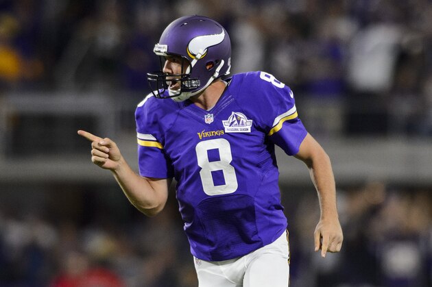 MINNEAPOLIS, MN - SEPTEMBER 18: Sam Bradford #8 of the Minnesota Vikings celebrates a touchdown against the Green Bay Packers during the game on September 18, 2016 at US Bank Stadium in Minneapolis, Minnesota. The Vikings defeated the Packers 17-14. (Photo by Hannah Foslien/Getty Images)