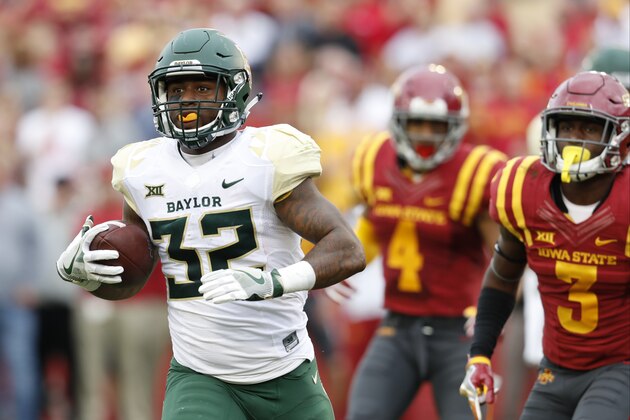 AMES, IA - OCTOBER 1: Running back Shock Linwood #32 of the Baylor Bears drives the ball into the end zone for a touchdown pas defensive back Evrett Edwards #4, and defensive back Mike Johnson #3 of the Iowa State Cyclones in the first half of play at Jack Trice Stadium on October 1, 2016 in Ames, Iowa. (Photo by David Purdy/Getty Images)