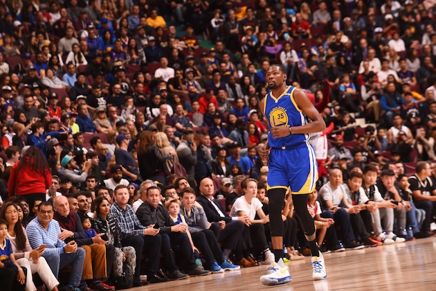 VANCOUVER, BC - OCTOBER 1:  Kevin Durant #35 of the Golden State Warriors looks on against the Toronto Raptors during a preseason game on October 1, 2016 at Rogers Arena in Vancouver, British Columbia, Canada. NOTE TO USER: User expressly acknowledges and agrees that, by downloading and or using this photograph, user is consenting to the terms and conditions of Getty Images License Agreement. Mandatory Copyright Notice: Copyright 2016 NBAE (Photo by Noah Graham/NBAE via Getty Images)