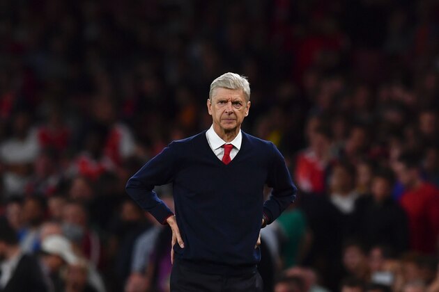Arsenal's French manager Arsene Wenger walks on the touchline at the end of the English Premier League football match between Arsenal and Chelsea at the Emirates Stadium in London on September 24, 2016.  / AFP / Ben STANSALL / RESTRICTED TO EDITORIAL USE. No use with unauthorized audio, video, data, fixture lists, club/league logos or 'live' services. Online in-match use limited to 75 images, no video emulation. No use in betting, games or single club/league/player publications.  /         (Photo credit should read BEN STANSALL/AFP/Getty Images)