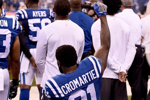 INDIANAPOLIS, IN - SEPTEMBER 25:  Antonio Cromartie #31 of the Indianapolis Colts kneels and raises his fist during the National Anthem before the game against the San Diego Chargers at Lucas Oil Stadium on September 25, 2016 in Indianapolis, Indiana.  (Photo by Stacy Revere/Getty Images)