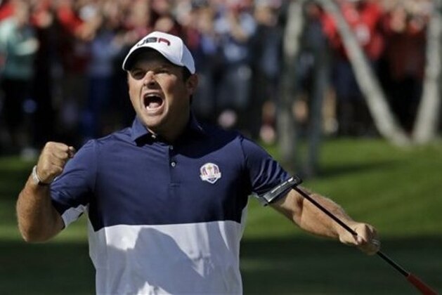 United States’ Patrick Reed reacts after saving par on the first hole during a singles match at the Ryder Cup golf tournament Sunday, Oct. 2, 2016, at Hazeltine National Golf Club in Chaska, Minn. (AP Photo/Chris Carlson)