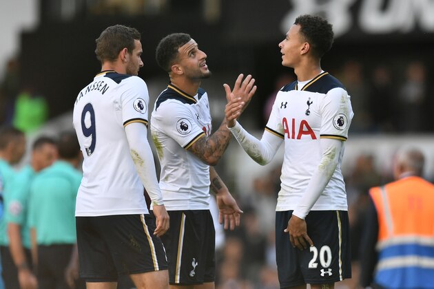LONDON, ENGLAND - OCTOBER 02: Kyle Walker of Tottenham Hotspur (C) and Dele Alli of Tottenham Hotspur (R) embrace after the final whistle during the Premier League match between Tottenham Hotspur and Manchester City at White Hart Lane on October 2, 2016 in London, England.  (Photo by Dan Mullan/Getty Images)