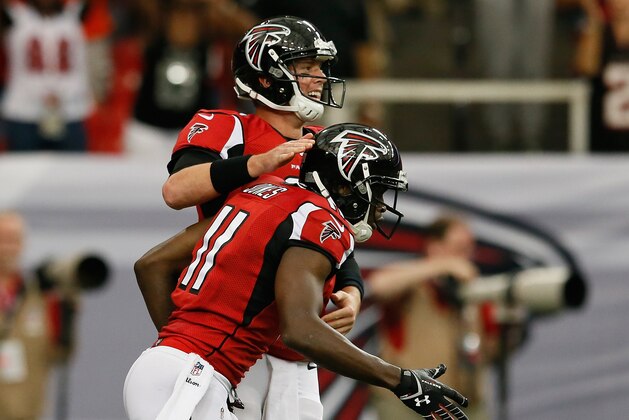 ATLANTA, GA - SEPTEMBER 15:  Matt Ryan #2 of the Atlanta Falcons congratulates Julio Jones #11 after Jones scored a touchdown off a reception against the St. Louis Rams at Georgia Dome on September 15, 2013 in Atlanta, Georgia.  (Photo by Kevin C. Cox/Getty Images)