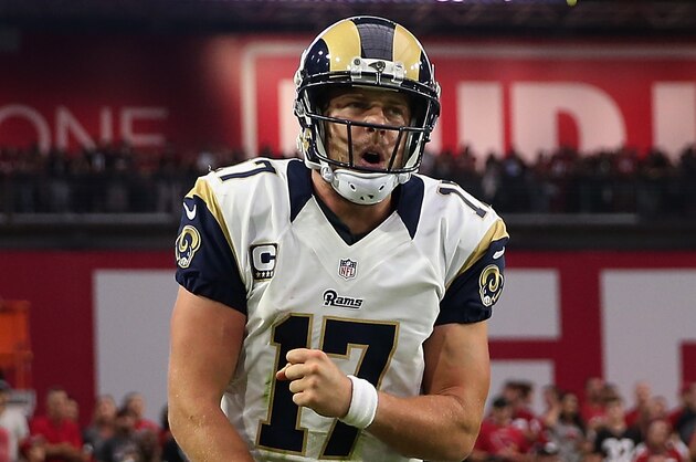 GLENDALE, AZ - OCTOBER 02:  Quarterback Case Keenum #17 of the Los Angeles Rams celebrates after scrambling with the football against the Arizona Cardinals during the third quarter of the NFL game at the University of Phoenix Stadium on October 2, 2016 in Glendale, Arizona.  (Photo by Christian Petersen/Getty Images)
