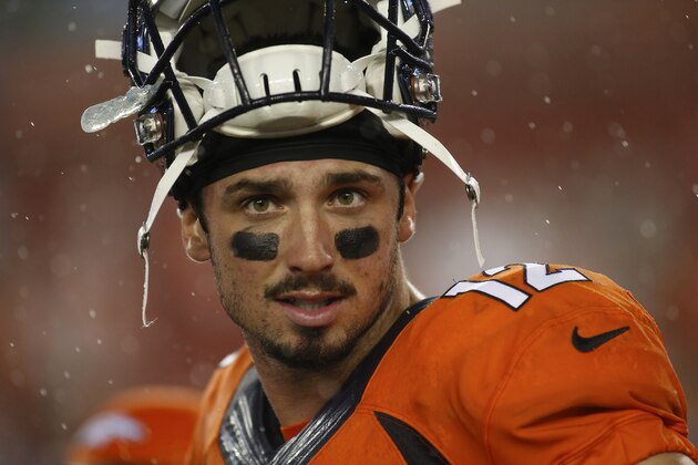 TAMPA, FL - OCTOBER 2:  Quarterback Paxton Lynch #12 of the Denver Broncos walks off the field in the rain following his 27-7 win over the Tampa Bay Buccaneers at the conclusion of an NFL game on October 2, 2016 at Raymond James Stadium in Tampa, Florida. (Photo by Brian Blanco/Getty Images)