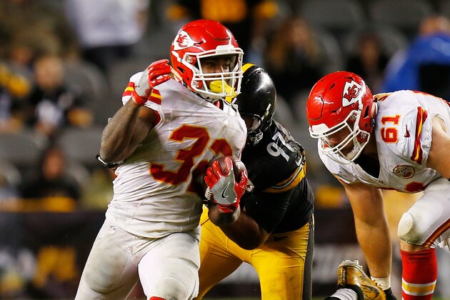PITTSBURGH, PA - OCTOBER 02: Spencer Ware #32 of the Kansas City Chiefs is tackled by Cameron Heyward #97 of the Pittsburgh Steelers in the second half during the game at Heinz Field on October 2, 2016 in Pittsburgh, Pennsylvania. (Photo by Justin K. Aller/Getty Images)