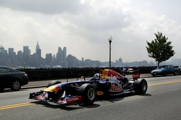 WEEHAWKEN, NJ - AUGUST 15:  Former Red Bull Racing Formula 1 driver David Coulthard drives the Red Bull running show car for a video shoot on August 15, 2012 in Weehawken, New Jersey.  (Photo by Jeff Zelevansky/Getty Images for Red Bull)