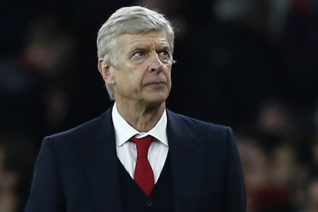 Arsenal's French manager Arsene Wenger gestures on the touchline during the English Premier League football match between Arsenal and Chelsea at the Emirates Stadium in London on January 24, 2016. Chelsea won the game 1-0. AFP PHOTO / IKIMAGES

RESTRICTED TO EDITORIAL USE. No use with unauthorized audio, video, data, fixture lists, club/league logos or 'live' services. Online in-match use limited to 45 images, no video emulation. No use in betting, games or single club/league/player publications. / AFP / IKIMAGES        (Photo credit should read IKIMAGES/AFP/Getty Images)