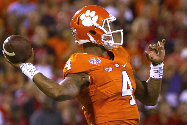 Oct 1, 2016; Clemson, SC, USA; Clemson Tigers quarterback Deshaun Watson (4) looks to pass the ball during the first quarter against the Louisville Cardinals at Clemson Memorial Stadium. Mandatory Credit: Joshua S. Kelly-USA TODAY Sports