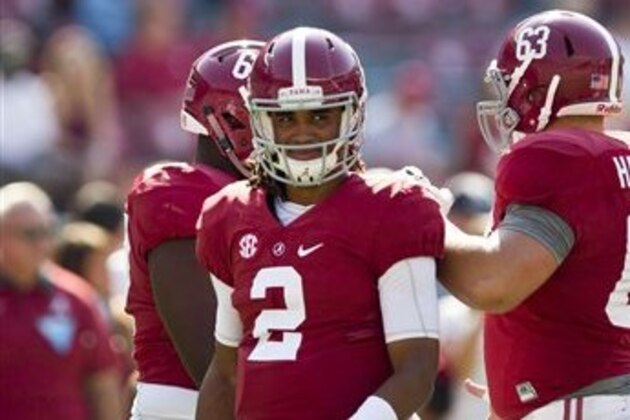 Alabama quarterback Jalen Hurts walks off the field before an NCAA college football game against Kent State, Saturday, Sept. 24, 2016, in Tuscaloosa, Ala. (AP Photo/Brynn Anderson)