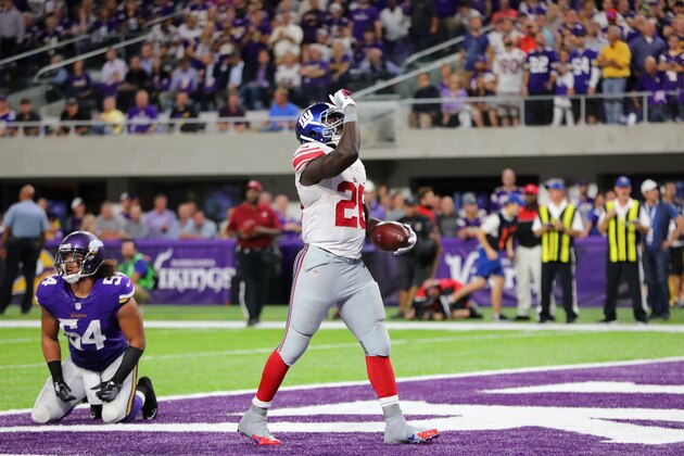 MINNEAPOLIS, MN - OCTOBER 3: Orleans Darkwa #26 of the New York Giants celebrates his touchdown in the second half of the game against the Minnesota Vikings on October 3, 2016 at US Bank Stadium in Minneapolis, Minnesota. (Photo by Adam Bettcher/Getty Images)