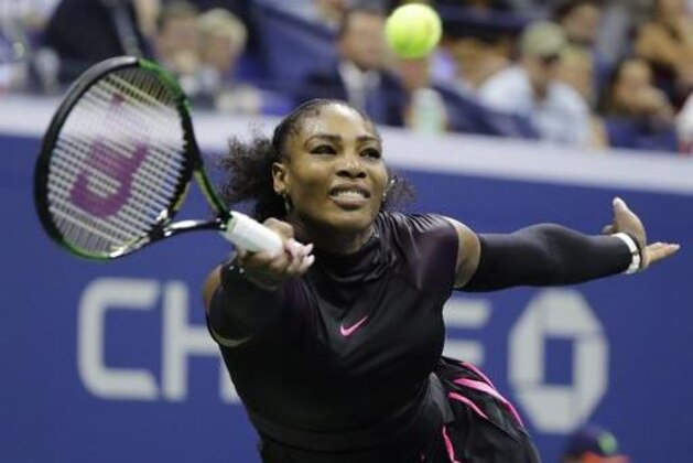FILE - In this Thursday, Sept. 8, 2016 file photo, Serena Williams returns a shot to Karolina Pliskova, of the Czech Republic, during the semifinals of the U.S. Open tennis tournament, in New York. Williams says she “won’t be silent” about the killing of black men by police officers. Williams wrote on Facebook on Tuesday, Sept. 27, 2016, that she was inspired to speak out after asking her black 18-year-old nephew to drive her to a meeting. (AP Photo/Darron Cummings, File)