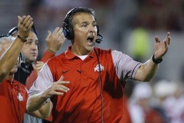 Ohio State head coach Urban Meyer shouts from the sidelines in the fourth quarter of an NCAA college football game against Oklahoma in Norman, Okla., Saturday, Sept. 17, 2016. Ohio State won 45-24. (AP Photo/Sue Ogrocki)