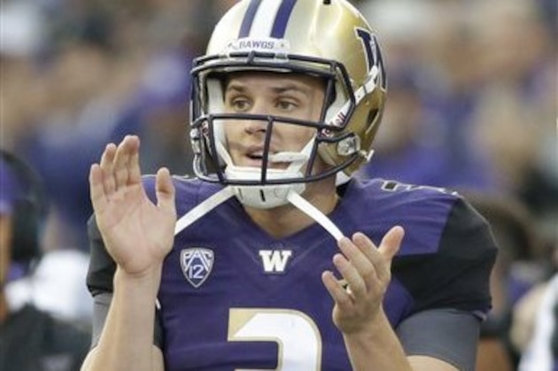 Washington quarterback Jake Browning reacts on the sidelines during an NCAA college football game against Stanford, Friday, Sept. 30, 2016, in Seattle. (AP Photo/Ted S. Warren)